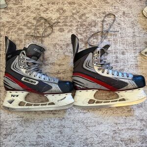 Bauer Skates with Red and Gray Design